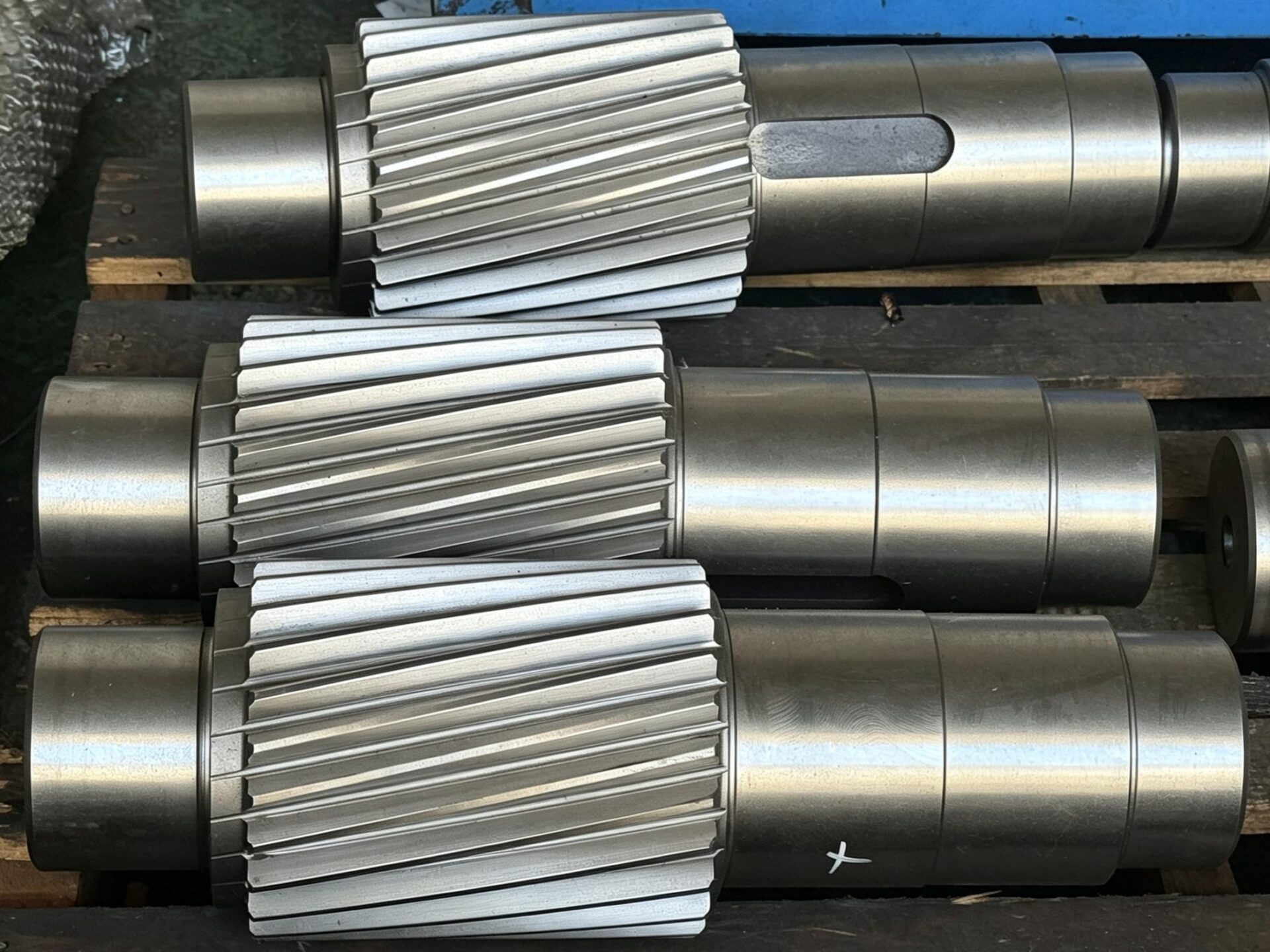 Custom gear shaft manufactured for precision industrial transmission